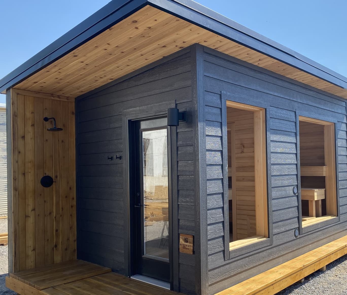 A finished cabin exterior with its cedar deck